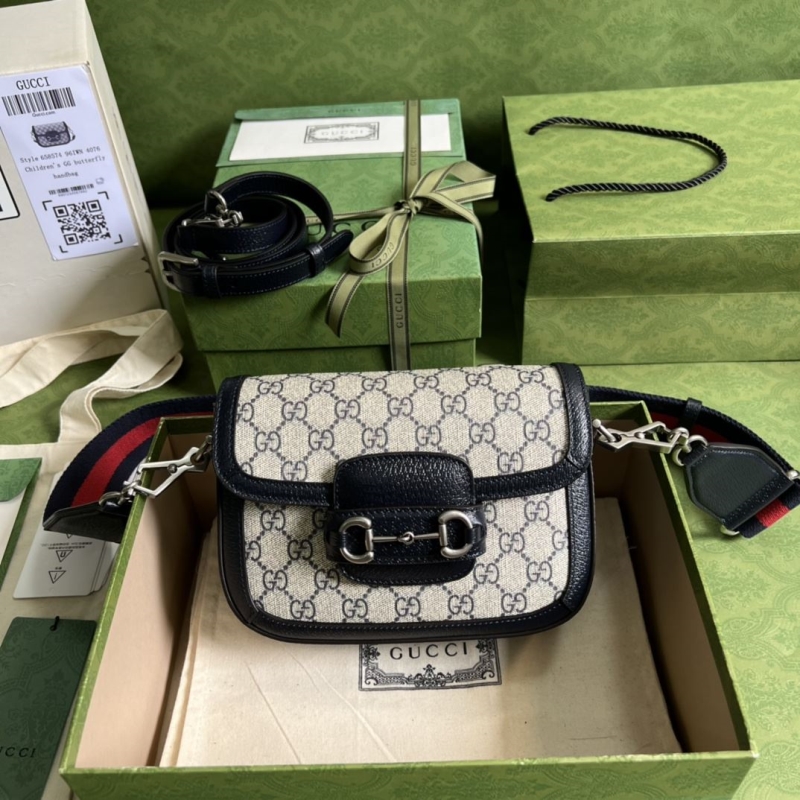 G*u*i satchel bags
